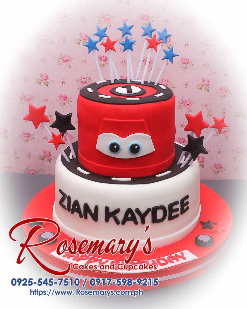 Two-layer red and white Cars themed cake from Rosemary's Cakes, a delicious treat for any celebration. Contact: 0917-598-9215.