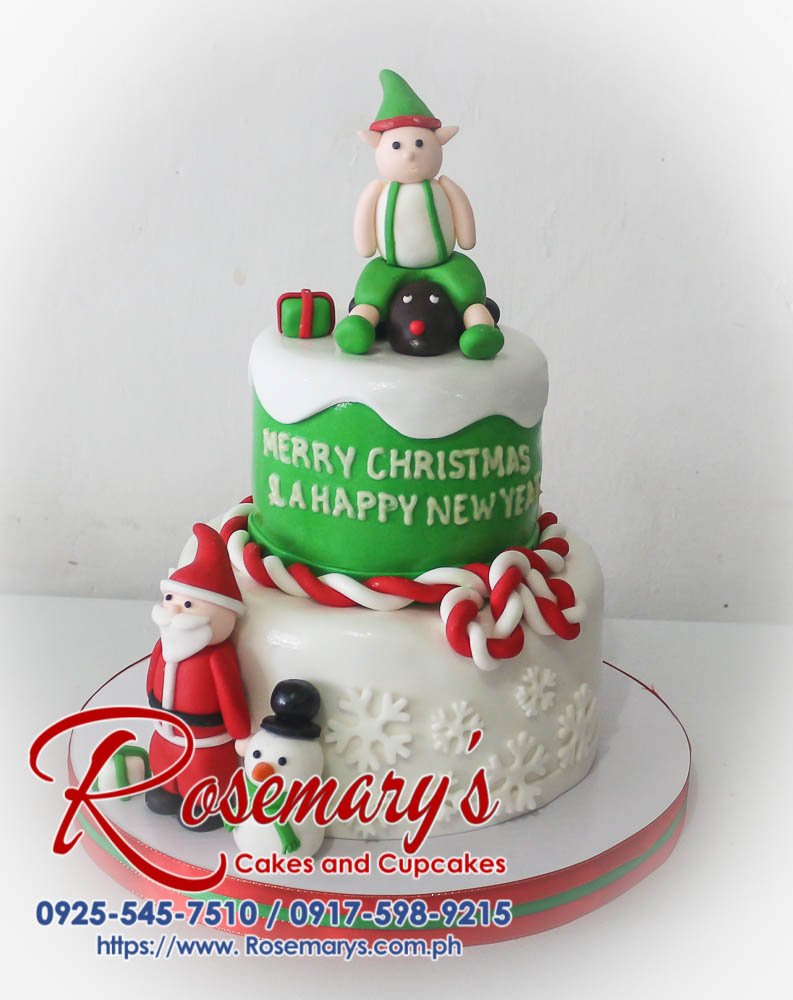 2 Layer Christmas-New Year Cake Delicious two-tier red and white Christmas cake with a fondant Santa Claus topper. Order yours from Rosemary's Cakes: 0917-598-9215.