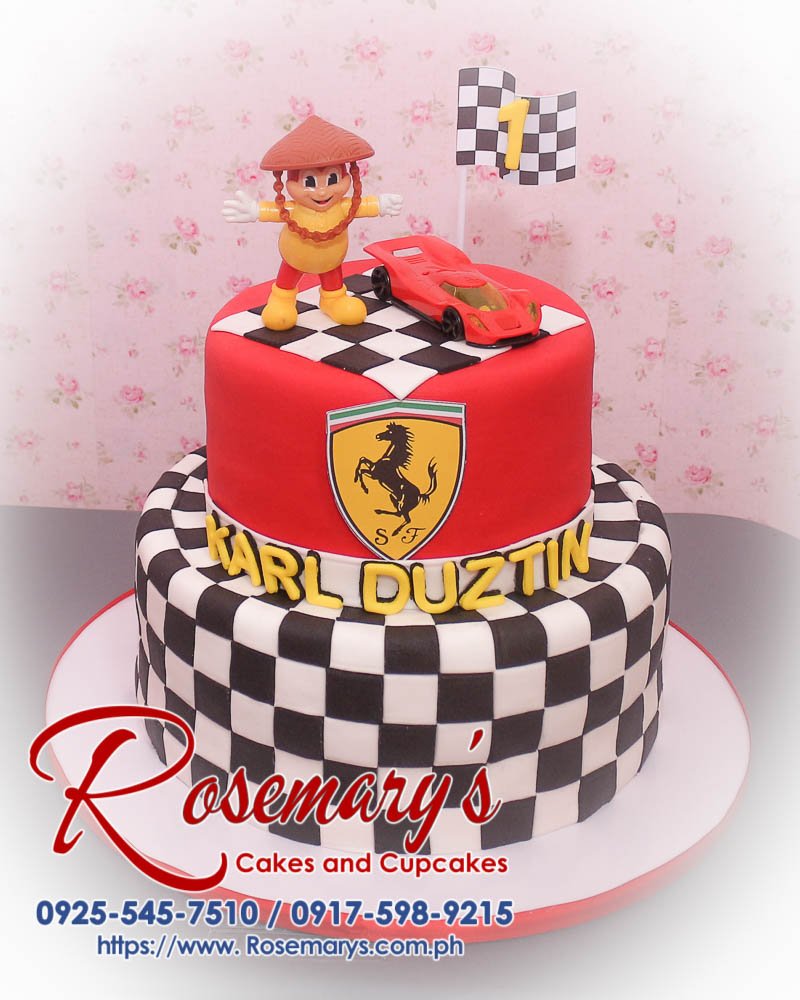 Delicious 2-layer Ferrari themed cake with black and red accents, topped with Jollibee details. Order at Rosemary's Cakes: 0925-545-7510.