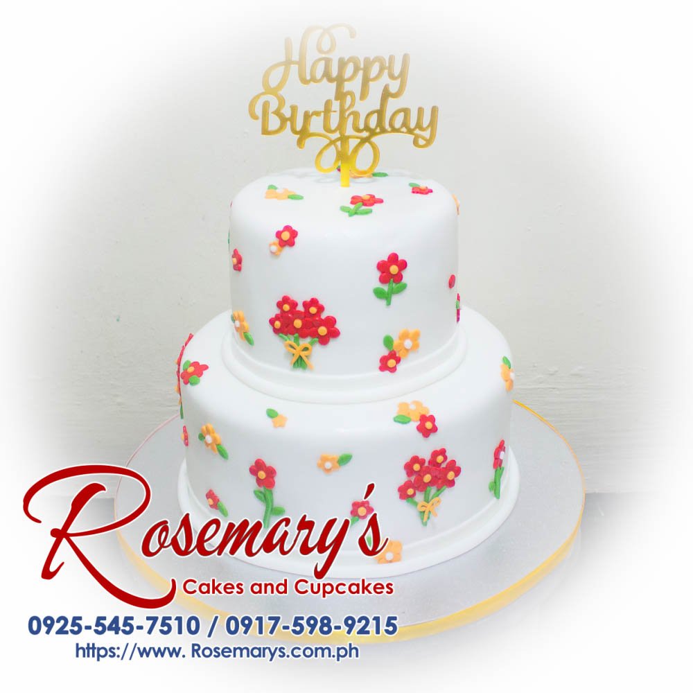 Delicious 2 layer floral themed birthday cake adorned with vibrant flowers, created by Rosemary's Cakes. Contact: 0917-598-9215.