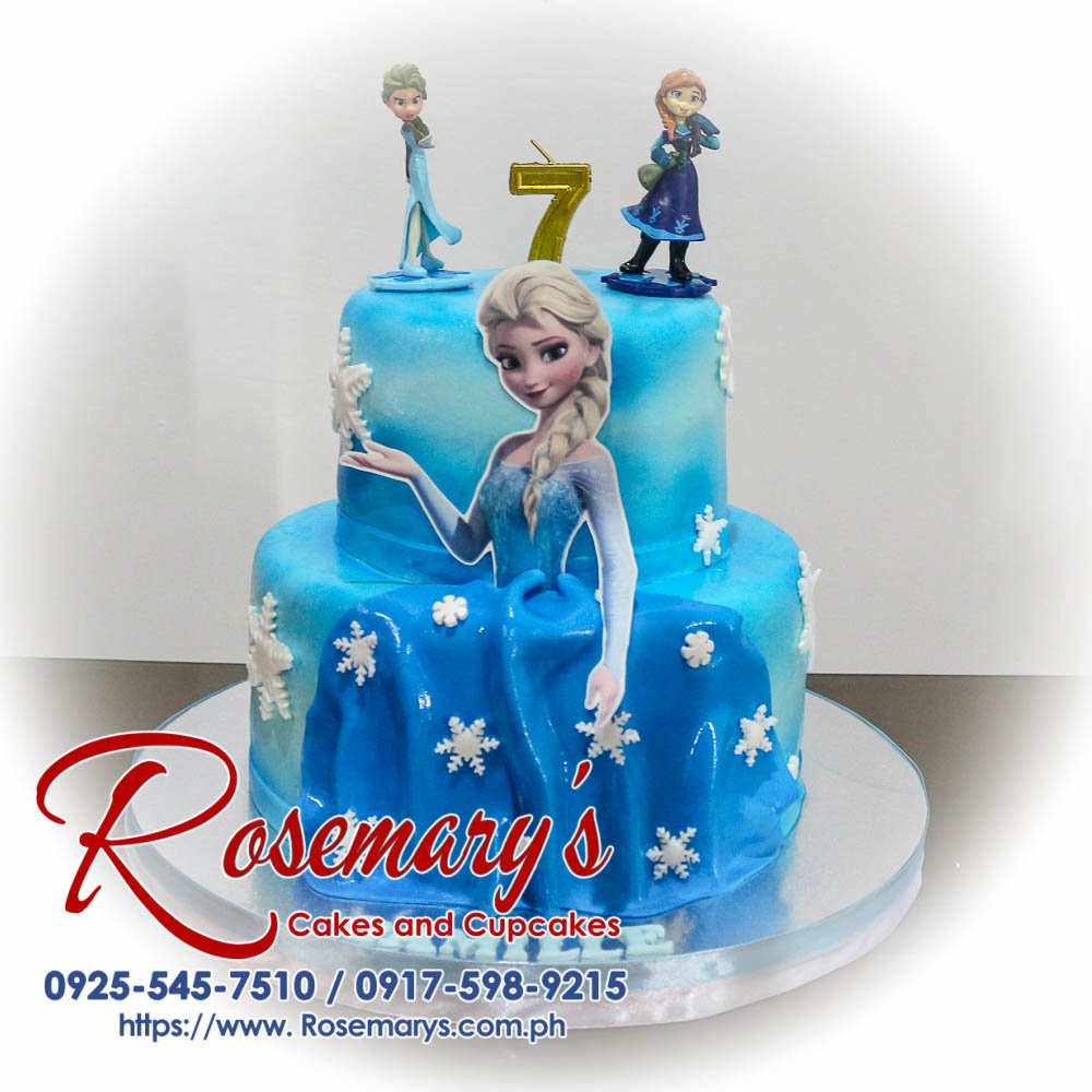 Delicious 2 layer Frozen themed cake with Elsa and Anna, beautifully decorated in blue. Order from Rosemary's Cakes, 0917-598-9215.