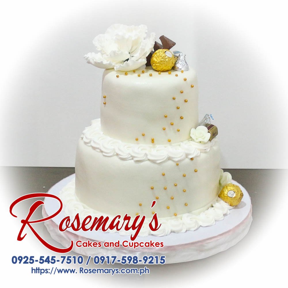 Delicious 2 layer gold and white cake with rich chocolate accents. Perfect for any celebration! Rosemary's Cakes, 0925-545-7510.