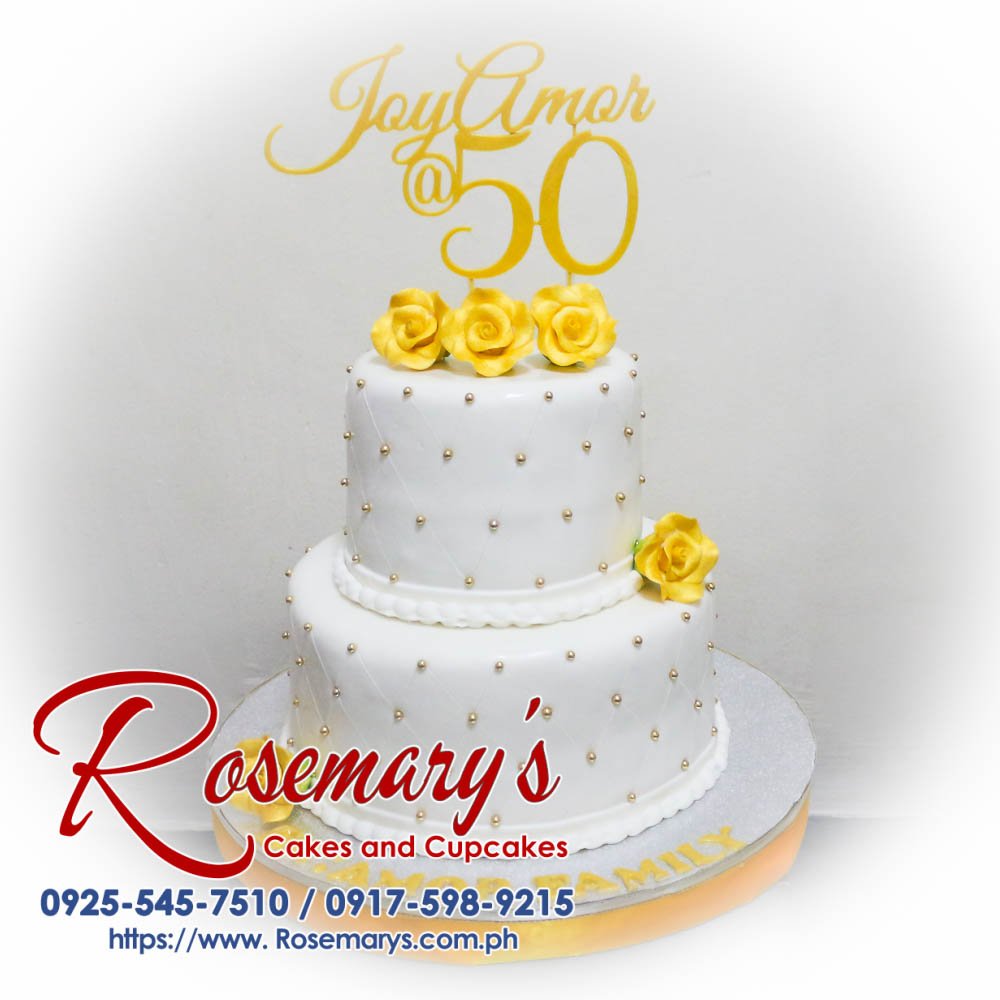 Decadent 2-layer gold and white themed cake by Rosemary's Cakes, featuring intricate 3D printed details. Contact: 0925-545-7510.