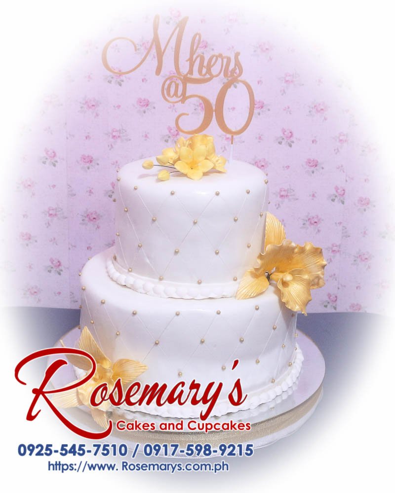 2 Layer Gold and White Cake for Mher’s 50th Birthday Elegant 2 layer gold and white cake by Rosemary's Cakes, featuring intricate 3D printed designs. Contact: 0925-545-7510.