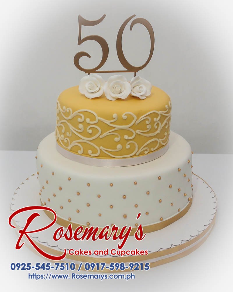 2 Layer Gold and White Cake with a 3D Printed Topper Elegant 2-tier gold and white cake adorned with a stunning 3D printed topper. Perfect for themed celebrations! Order yours from Rosemary's Cakes: 0917-598-9215.