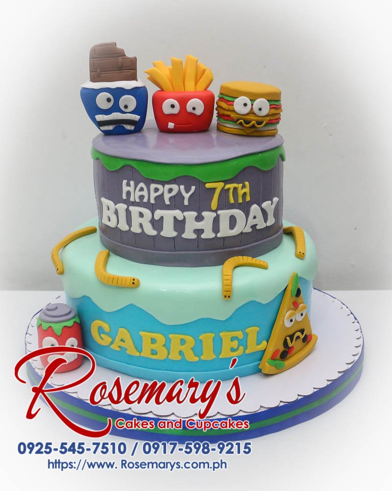 2 Layer Grossery Gang Cake for Gabriel’s 7th Birthday Two-tier chocolate birthday cake adorned with a fondant Grossery Gang character. Delicious and perfect for any celebration! By Rosemary's Cakes: 0925-545-7510