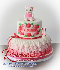 Delectable two-tier pink cake adorned with a fondant Hello Kitty topper. Perfect for birthdays and celebrations! Order yours from Rosemary's Cakes: 0917-598-9215.
