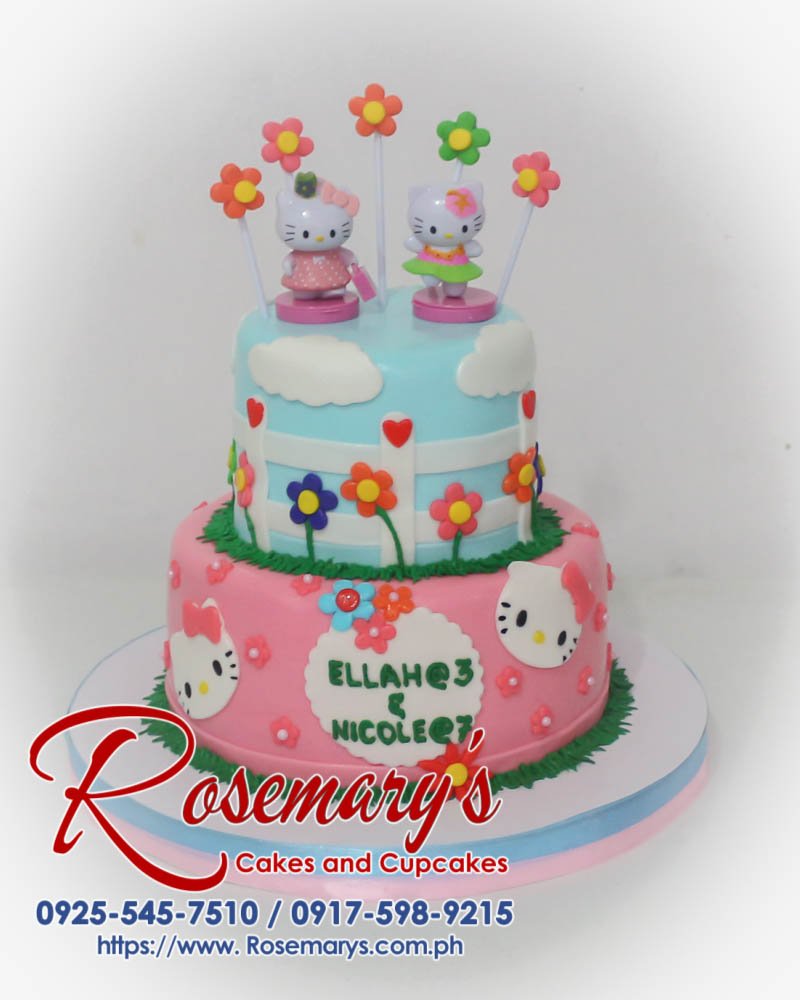Adorable two-tier Hello Kitty cake with pink and white frosting, perfect for any celebration. Order yours from Rosemary's Cakes! Call 0917-598-9215.