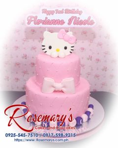 Delicious 2-layer Hello Kitty cake by Rosemary's Cakes, featuring pink frosting and adorable themed decorations. Contact: 0917-598-9215.