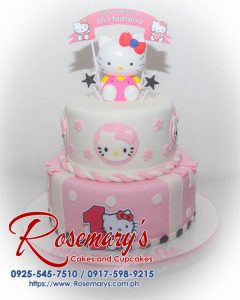Two-tier Hello Kitty cake decorated in pink with fondant details. Perfect for birthdays! By Rosemary's Cakes | 0925-545-7510