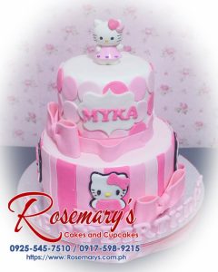 Delicious 2 layer Hello Kitty cake in pink with a ribbon, perfect for celebrations. Order from Rosemary's Cakes: 0917-598-9215.