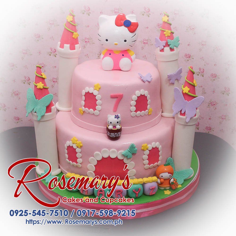 Delicious 2 layer Hello Kitty castle cake in pink, featuring intricate designs. Order from Rosemary's Cakes: 0925-545-7510.