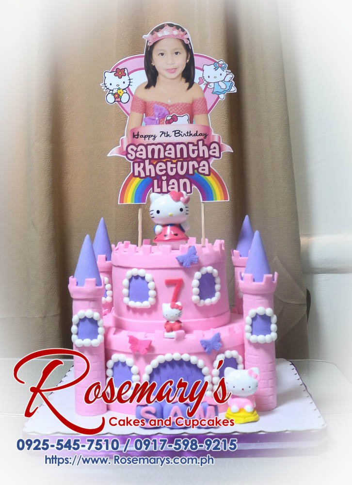 Two-tier Hello Kitty castle cake adorned with pink and purple icing. Order your custom cake from Rosemary's Cakes: 0925-545-7510.