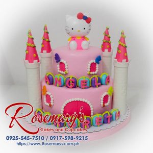 Delicious two-tier Hello Kitty cake with pink frosting and details. Order your custom cakes from Rosemary's Cakes: 0917-598-9215.