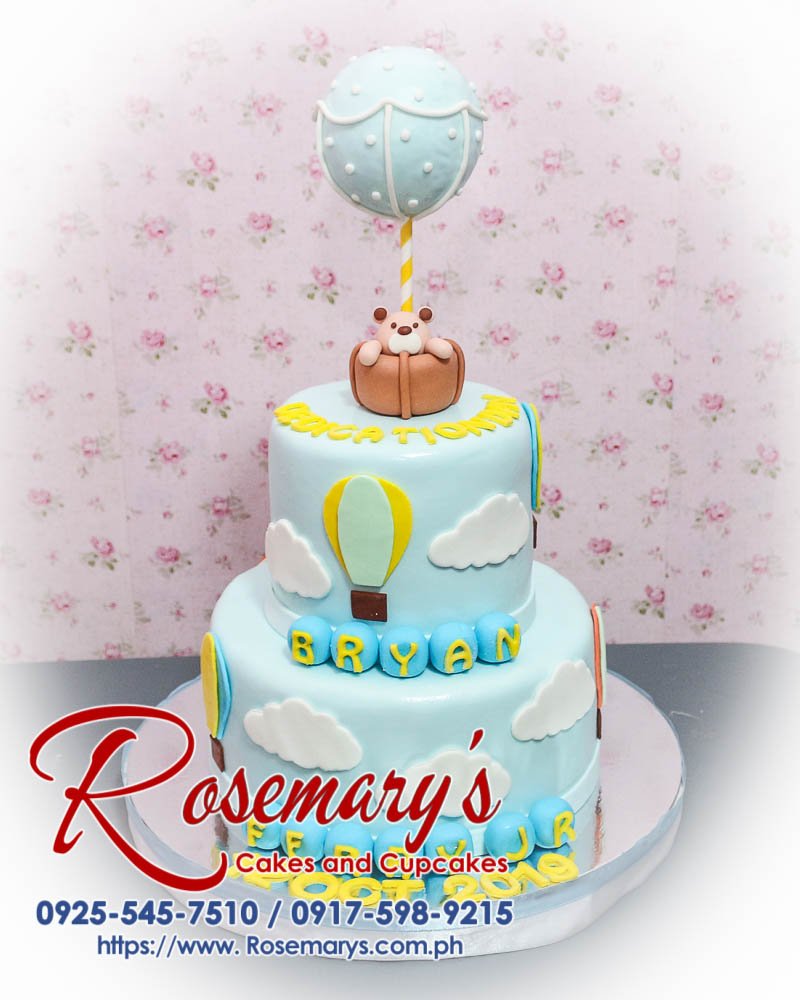 Delicious 2 layer hot air balloon cake in blue, adorned with teddy bears. Perfect for any celebration. Rosemary's Cakes, 0917-598-9215.