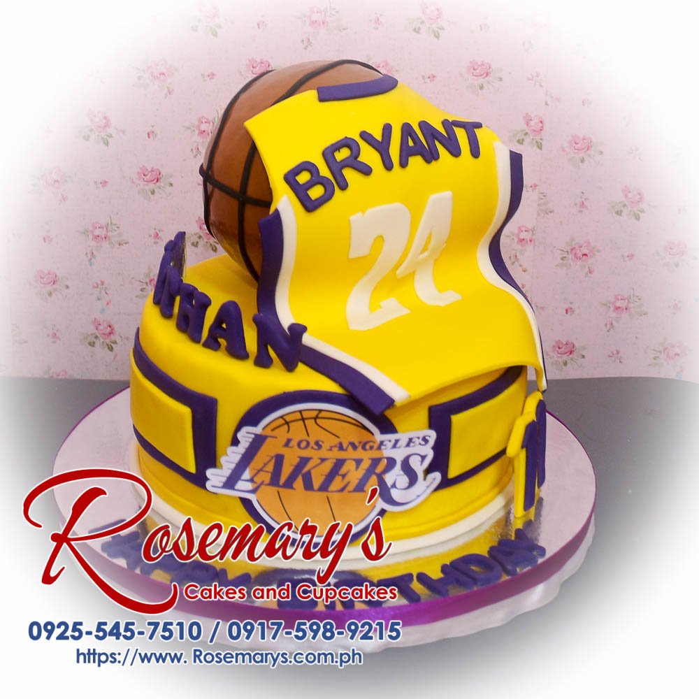 Two-layer Lakers themed cake with vibrant purple and gold frosting, decorated with basketball accents. From Rosemary's Cakes, 0925-545-7510.