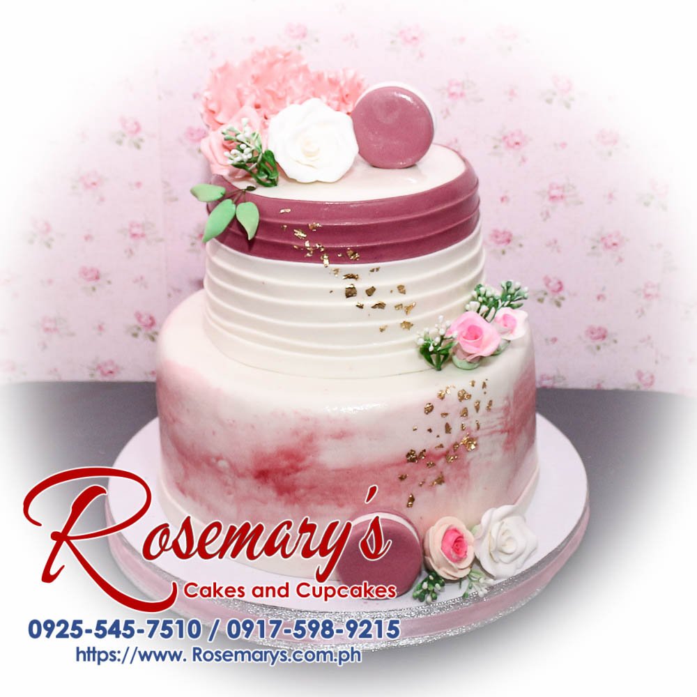 2 Layer Macarons and Flowers Themed Cake Delicious 2 layer macarons and flowers themed cake from Rosemary's Cakes. Contact: 0917-598-9215.