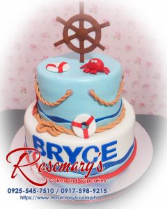 Delicious 2 layer marine themed cake in blue hues, beautifully decorated with ocean motifs. Order from Rosemary's Cakes, 0917-598-9215.
