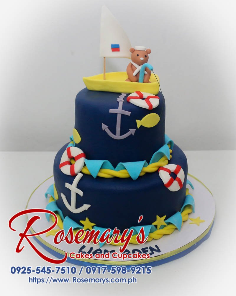 2 Layer Marine Themed Cake with Fondant Bear Topper for Liam Aden Two-tiered marine-themed cake decorated with fondant details and a cute bear topper. Order your custom cake from Rosemary's Cakes! Call 0925-545-7510.