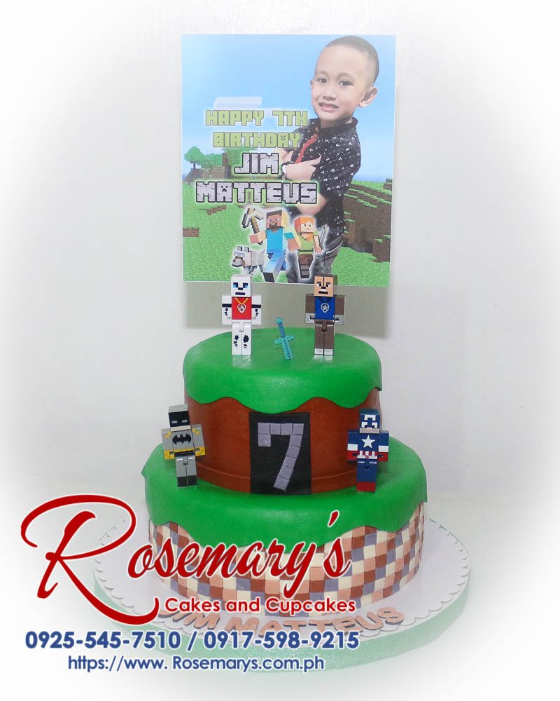 Delicious 2-tier Minecraft cake with intricate green and brown details. Order your custom cake from Rosemary's Cakes: 0917-598-9215.