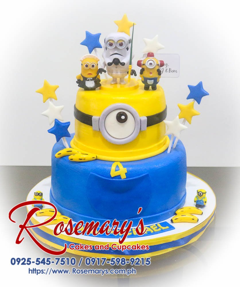 Two-tier Minion themed birthday cake with yellow and blue frosting. Order your custom cake from Rosemary's Cakes! Call 0925-545-7510.