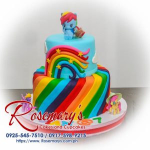 Delicious two-layer blue cake with a My Little Pony theme and colorful rainbow accents. Order your custom cake from Rosemary's Cakes: 0917-598-9215.