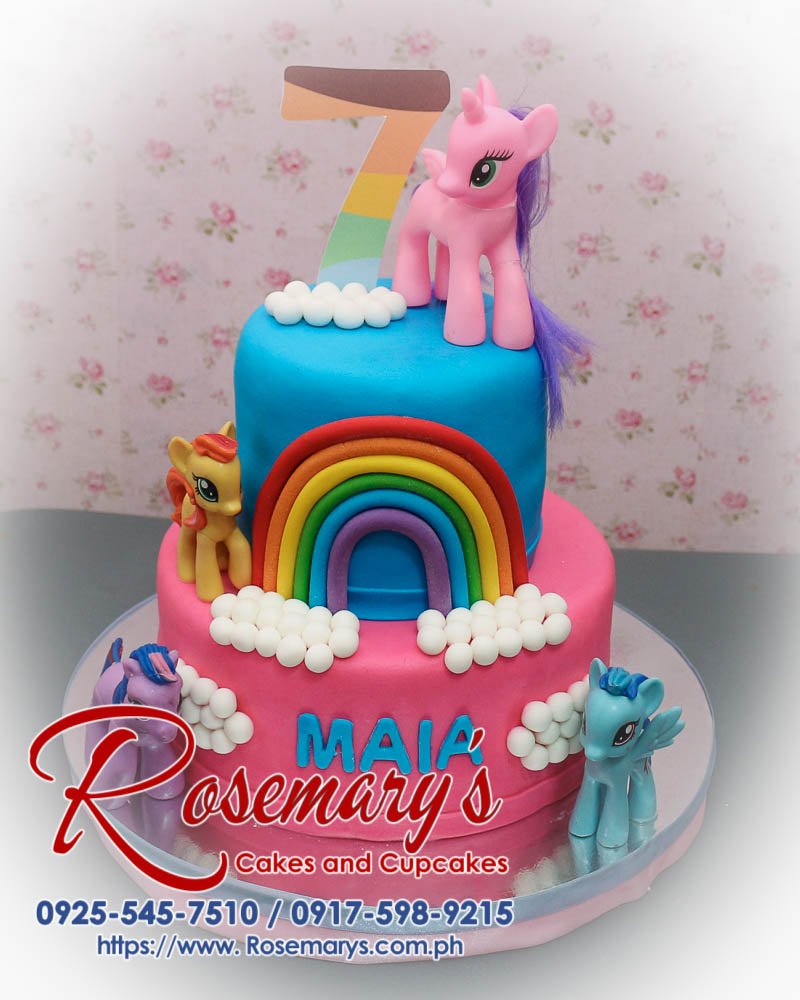 Delicious 2 layer My Little Pony cake in blue and pink, adorned with a rainbow, by Rosemary's Cakes. Contact: 0925-545-7510.