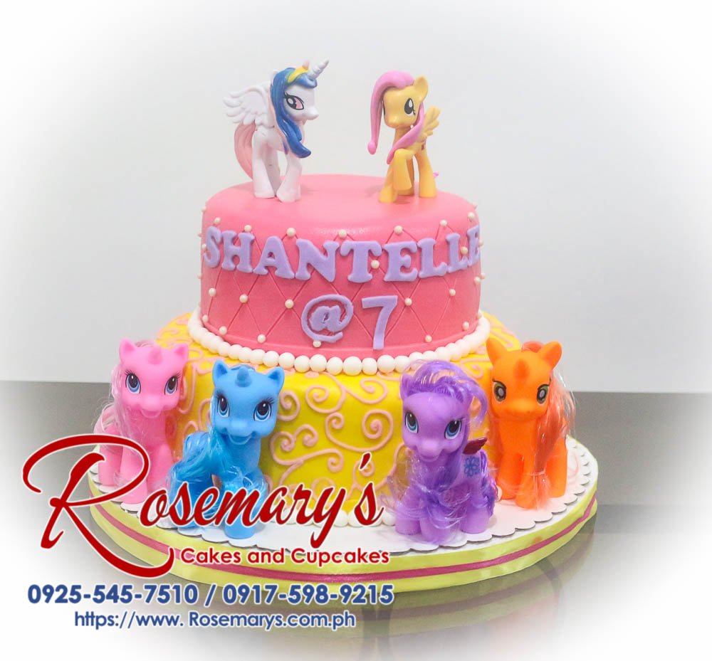 2 Layer My Little Pony Cake for Shantelle Delicious two-tier yellow cake decorated with pink frosting and My Little Pony figurines. Perfect for birthdays! Rosemary's Cakes | 0925-545-7510