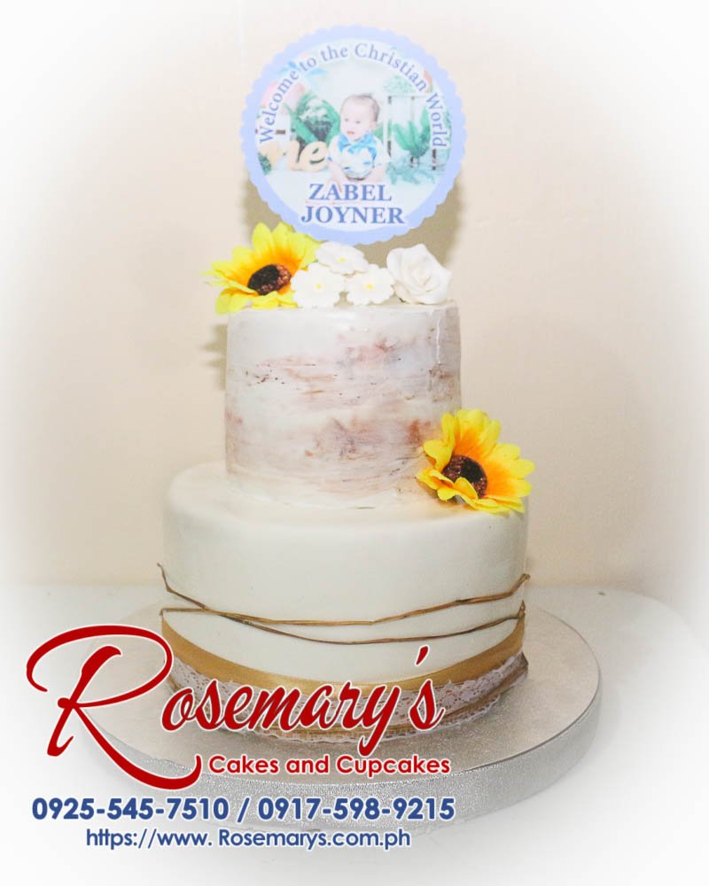Delicious 2 layer naked cake with delicate floral accents, perfect for a baptismal or christening. Order from Rosemary's Cakes at 0917-598-9215.