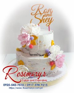 Elegant 2 layer naked wedding cake by Rosemary's Cakes, featuring 3D printed decorations and delicious flavors. Contact: 0925-545-7510.