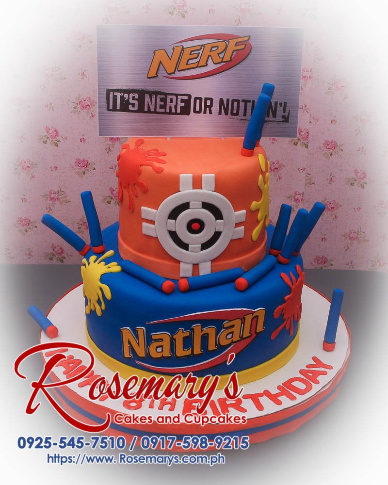 2 Layer Nerf Themed Cake for Nathan Delicious 2 layer Nerf themed cake with vibrant blue and orange frosting, perfect for any celebration. From Rosemary's Cakes, 0917-598-9215.