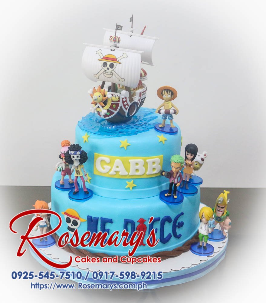 Delicious two-tier blue cake with intricate One Piece detailing. Order your custom cake from Rosemary's Cakes! Call 0917-598-9215.