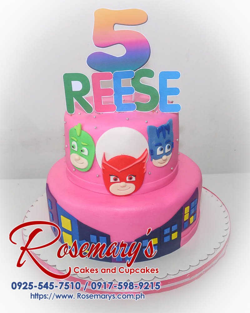 Delicious two-tier pink PJ Masks themed cake. Perfect for birthdays and celebrations. Order yours from Rosemary's Cakes: 0917-598-9215.