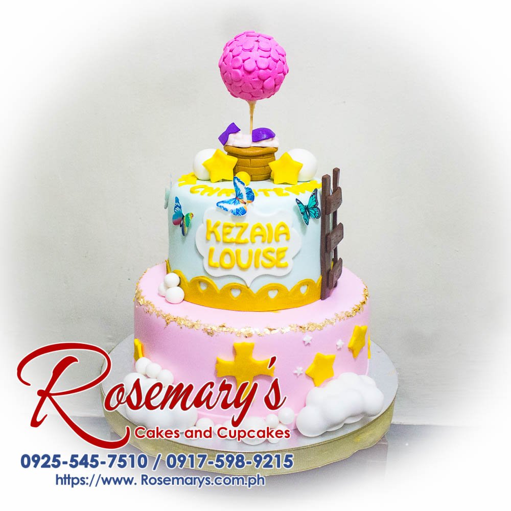 Two-layer pastel cake with delicate frosting and floral decorations. Perfect for christenings or special occasions. Order yours from Rosemary's Cakes! Call 0917-598-9215.