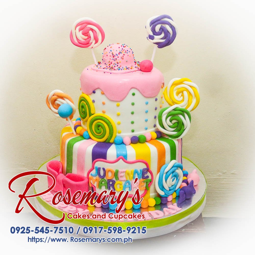 Delicious 2-layer pastel Candyland themed cake with vibrant decorations from Rosemary's Cakes. Contact: 0917-598-9215.
