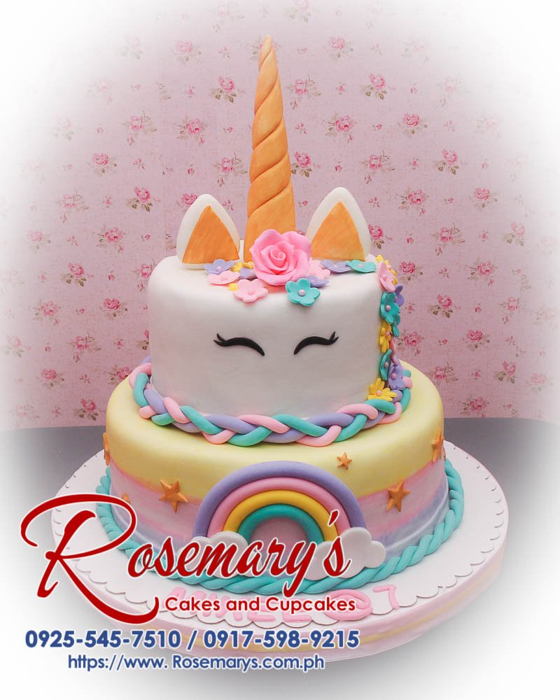 2 Layer Pastel Unicorn Cake for Mikee Delicious 2 layer pastel unicorn cake featuring vibrant rainbow colors, perfect for themed celebrations. From Rosemary's Cakes, call 0917-598-9215.