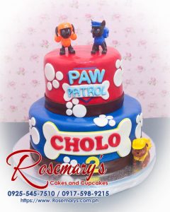 Delicious 2 layer Paw Patrol themed cake in vibrant blue and red, perfect for celebrations. From Rosemary's Cakes, 0925-545-7510.