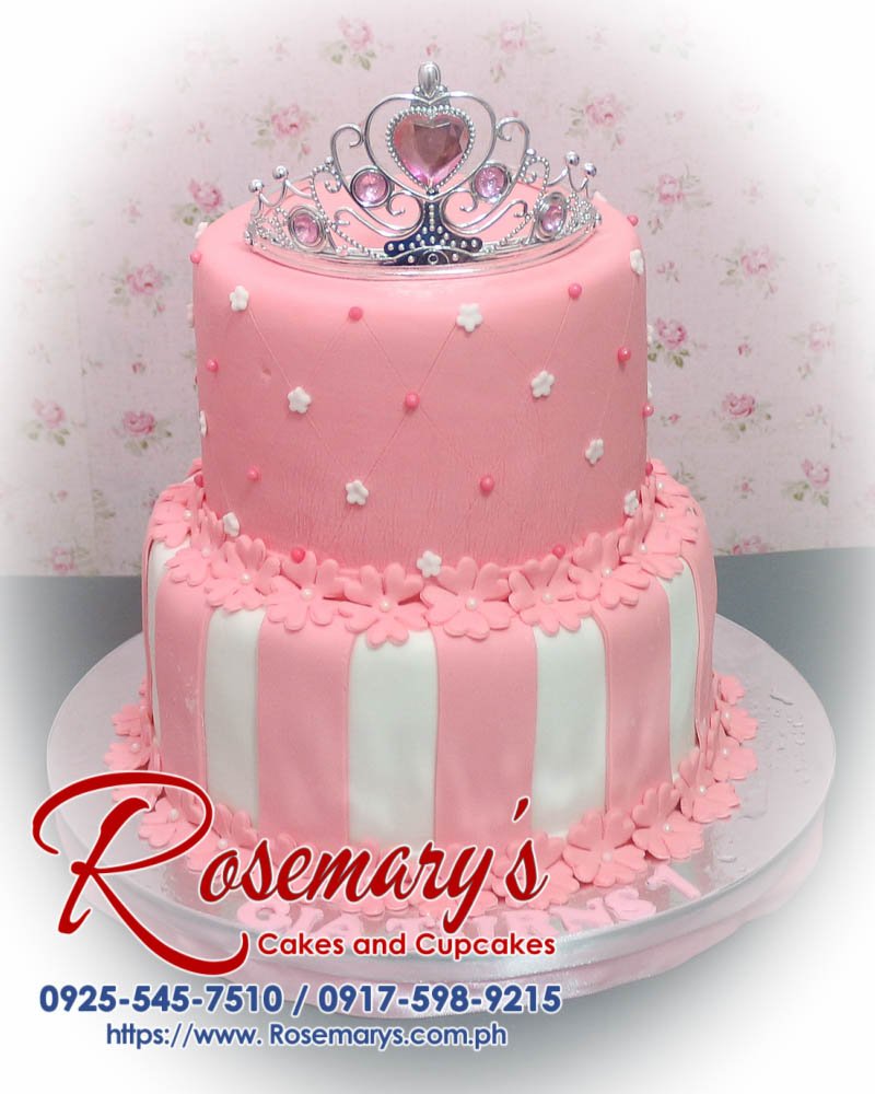 2 Layer Peach Princess Themed Cake for Gia Elegant 2 layer peach princess themed cake adorned with a sparkling crown and delicate flowers. Order from Rosemary's Cakes, 0917-598-9215.