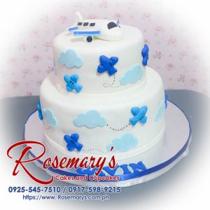 Delicious 2 layer pilot themed cake with blue and white design, showcasing an airplane. Order from Rosemary's Cakes: 0925-545-7510.