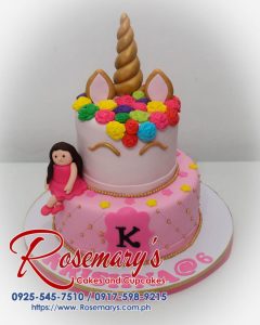 Two-tier pink and gold unicorn cake with custom fondant topper. Delicious and perfect for any celebration! Rosemary's Cakes: 0925-545-7510.