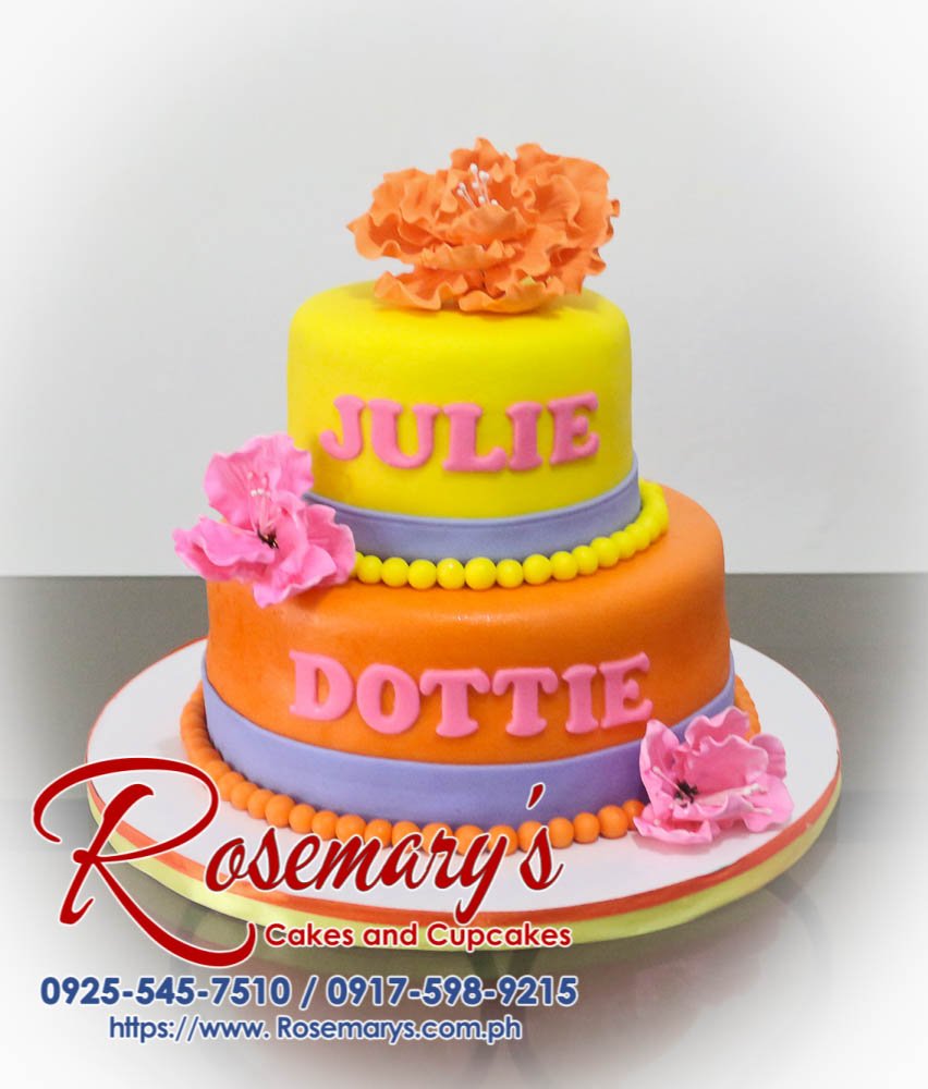 Delectable two-layer yellow cake frosted in vibrant pink and orange. Perfect for any celebration! Order yours from Rosemary's Cakes: 0917-598-9215.