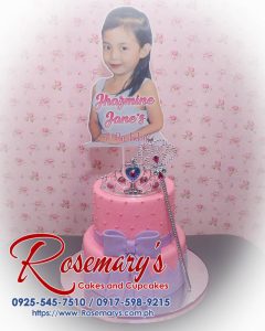 Delicious 2 layer pink and purple princess themed cake by Rosemary's Cakes. Contact 0917-598-9215 for your yummy cakes!
