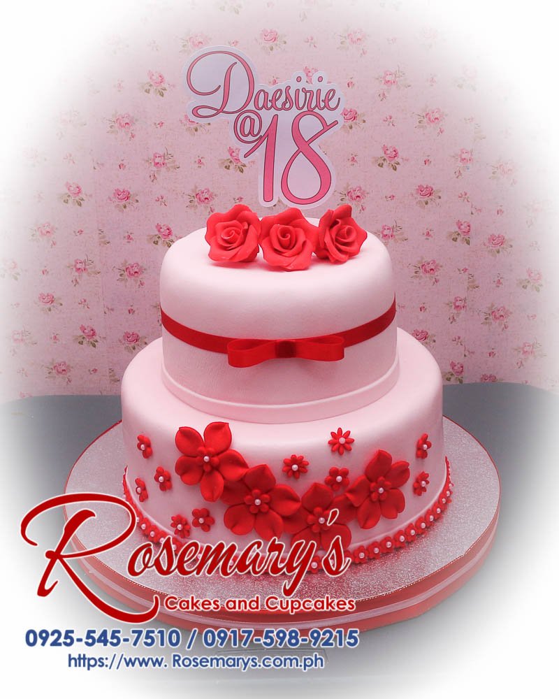 Delicious 2 layer pink and red themed cake from Rosemary's Cakes, perfect for celebrations. Contact: 0925-545-7510.