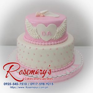 Two-tier pink and white angel cake with delicate fondant topper. Perfect for baby showers, baptisms, or christenings. Rosemary's Cakes: 0917-598-9215