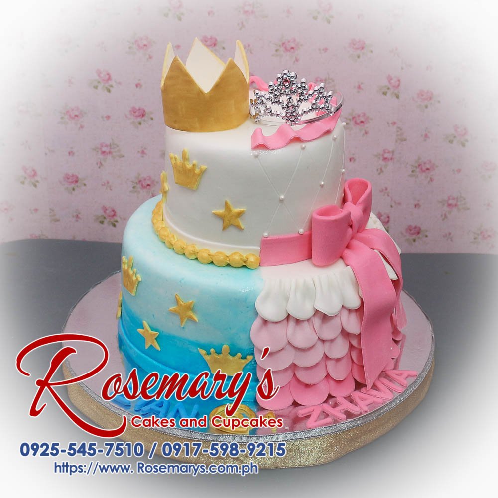 Delicious 2 layer prince and princess split cake by Rosemary's Cakes, featuring blue, pink, and gold accents. Contact: 0925-545-7510.
