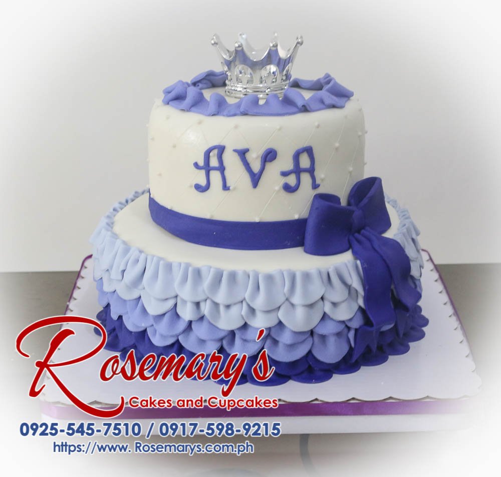 Delicious two-tier violet cake adorned with a delicate pink ribbon. Perfect for any princess celebration! Rosemary's Cakes - 0925-545-7510