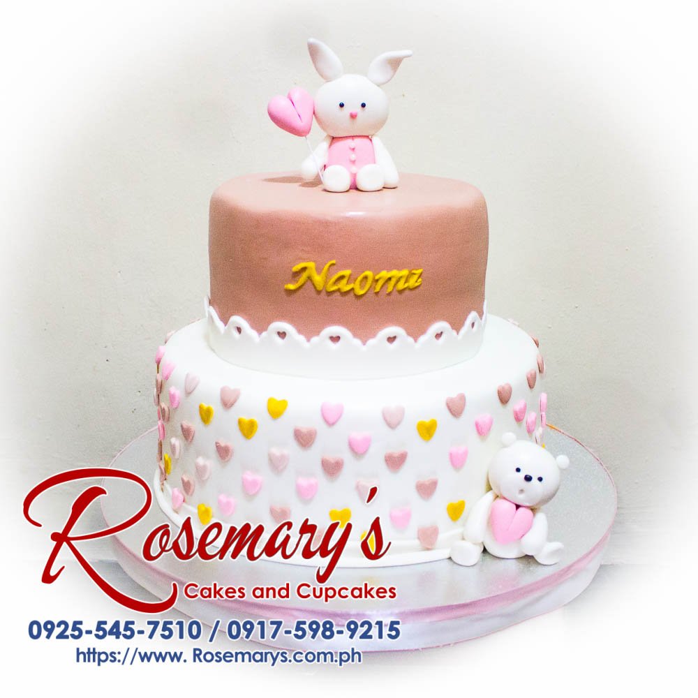 2 Layer Rabbit and Bear Cake for Naomi Two-layer vanilla cake decorated with adorable fondant rabbit and teddy bear toppers. Perfect for birthdays and special occasions! Rosemary's Cakes | 0925-545-7510