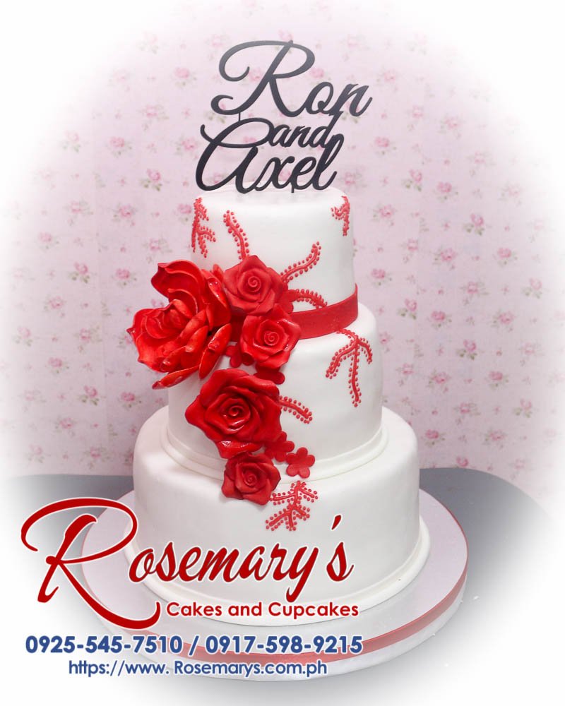Stunning 2 layer red and white wedding cake adorned with 3D printed roses. Delicious and perfect for any celebration. Rosemary's Cakes, 0917-598-9215.