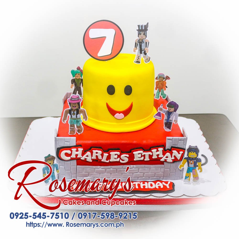 Two-layer red and yellow Roblox themed cake with white frosting accents. Delicious cake by Rosemary's Cakes. Order yours today! Call 0917-598-9215.