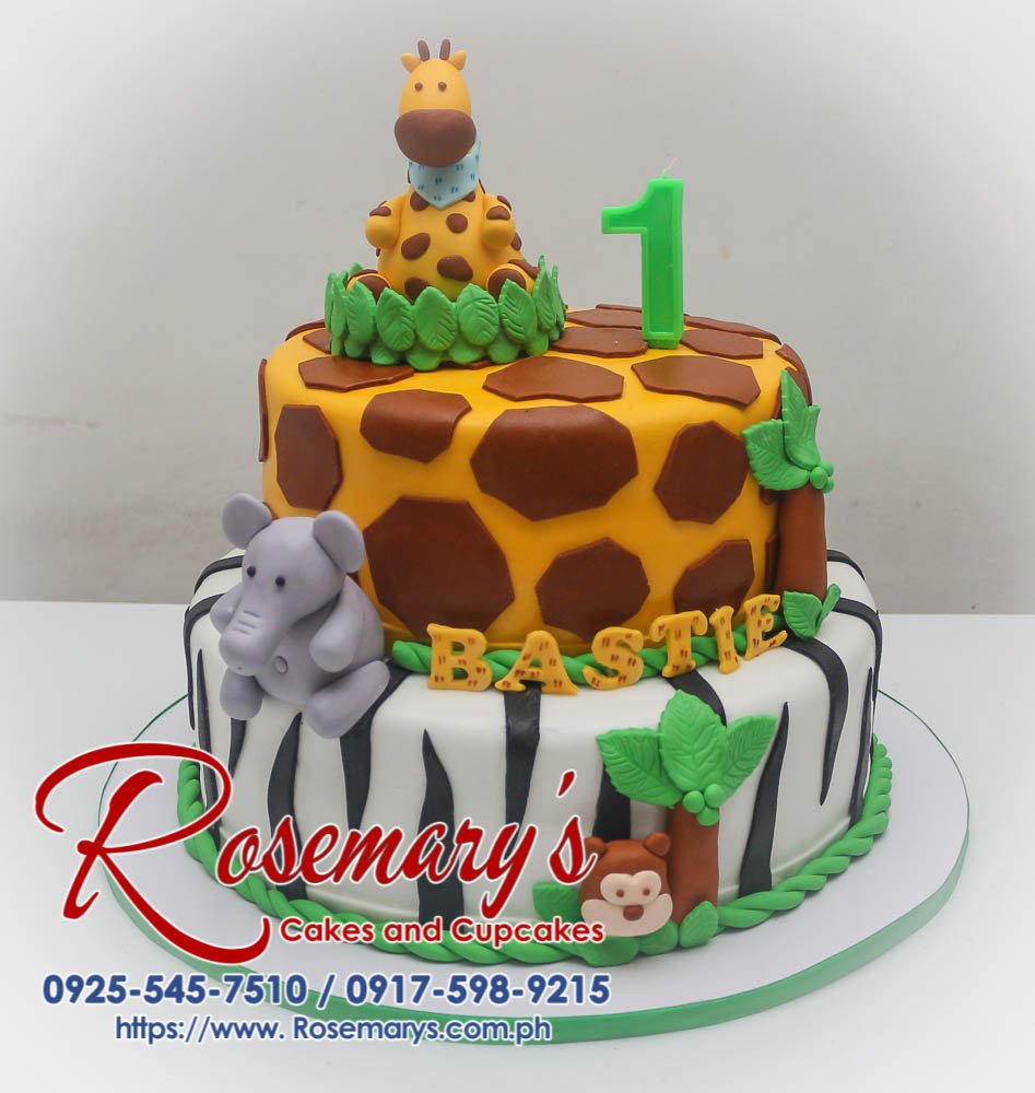 Two-tier black and yellow safari cake adorned with fondant elephants, giraffes, and other wildlife. Rosemary's Cakes 0917-598-9215